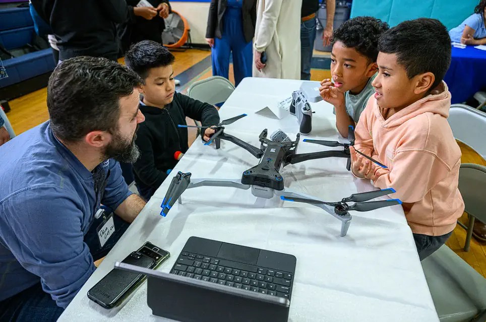 astoria students learn from career mentors and demonstrate drone flying skills at boys girls club